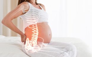 dhimbje prapa gjatë shtatzënisë, shkakton